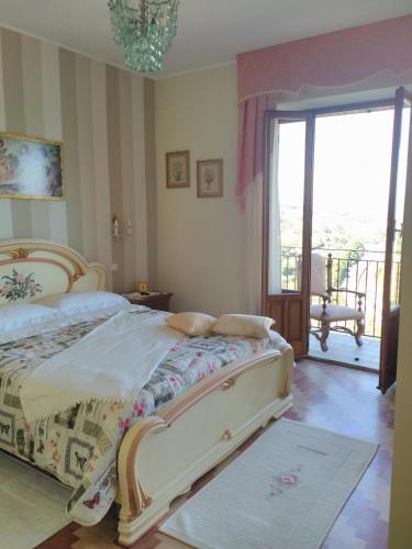 Postel nebo postele na pokoji v ubytování La Casa Di Torre Di Palme