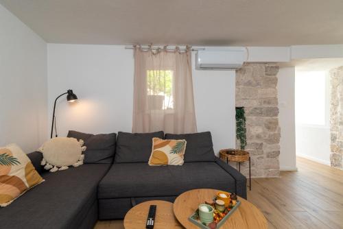 Traditional stone house Balatura with terrace, near the beach