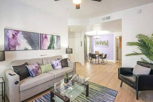 a living room with a couch and a table at Remodeled King Bed Suite Sonoran Sunset Lounge in Scottsdale
