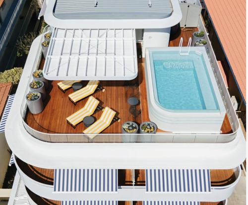 a model of a boat with a swimming pool at The Surf Yamba - Boutique Hotel in Yamba