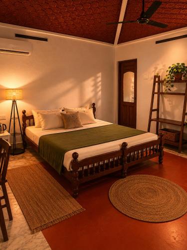 a bedroom with a large bed in a room at The cliff boutique in Varkala