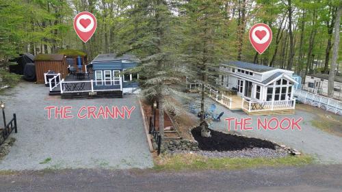 an aerial view of a camping site with a house at The Nook Tiny Home Fire Pit Close to Lake in Maple Lake