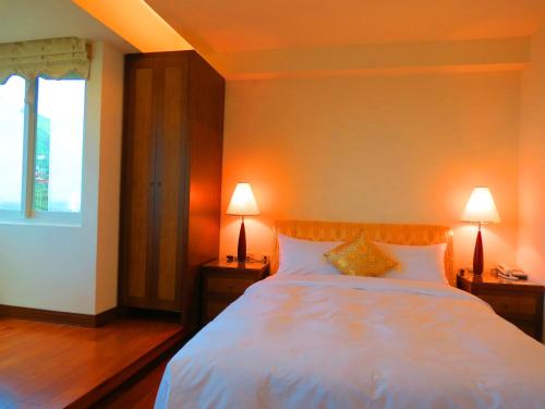 Katil atau katil-katil dalam bilik di Formosa Arcadian Villa