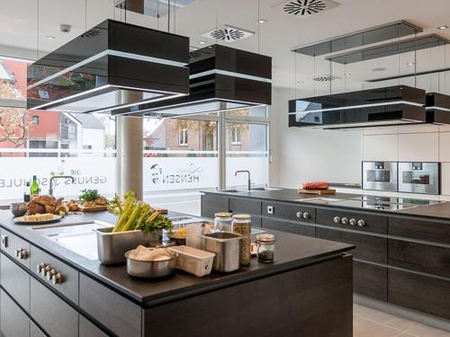 a kitchen with a counter with food on it at Hensens Residenz in Randerath
