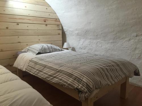 Postelja oz. postelje v sobi nastanitve Maison Le Plai-Syl