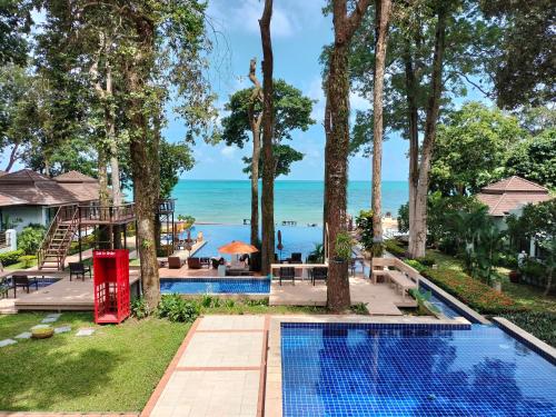 a view of the ocean from a resort pool at Chang Buri Resort & Koh Chang Hillside in Ko Chang