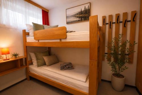 a couple of bunk beds in a room at Ausee Lodges Blindenmarkt in Blindenmarkt