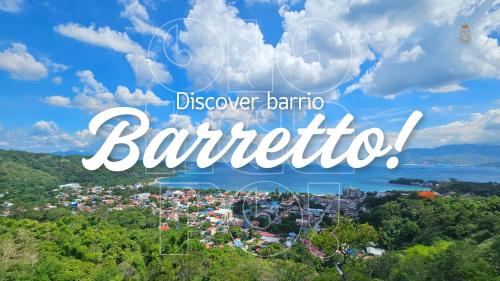 a view of a city with the text discover barrio barrio barrio bar at Hotel Bella Monte in Olongapo