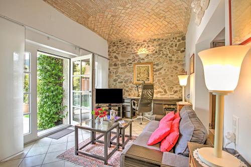 a living room with a couch and a table at Casa Tamè - Happy Rentals in Melide