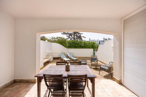 Apartment with Terrace in Prainha Resort, A short 200-meter walk to the beach, by QoZzy