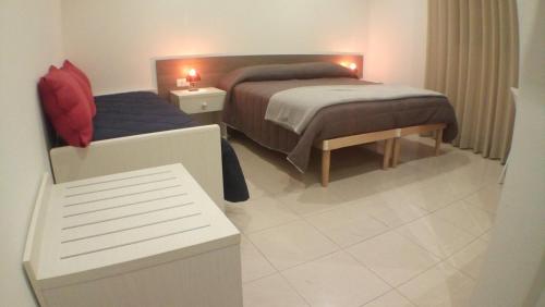 Matera Sassi Rooms 21/a e 21/bにあるベッド