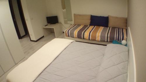 Matera Sassi Rooms 21/a e 21/bにあるベッド
