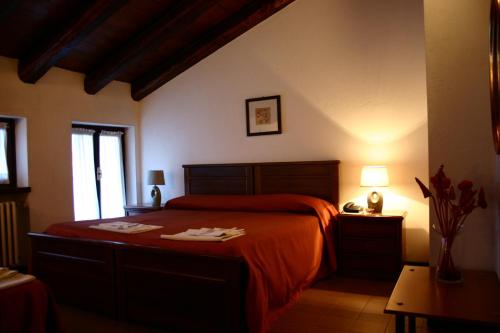 Posteľ alebo postele v izbe v ubytovaní Hotel Ciocca