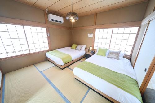 เตียงในห้องที่ Tomisato's House
