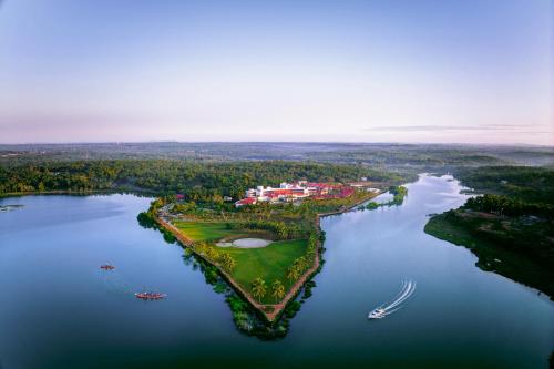 an aerial view of a golf course on a lake at Gateway Bekal, Kerala in Bekal