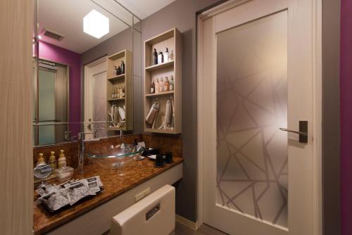 A kitchen or kitchenette at Hotel in the Moon (Adult Only)