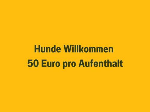 a sign that reads hundred willuminati euro pro antiparticle at Ferienwohnung Anemone - 4 Zimmer mit Bergblick & Alpenflair in Germaringen