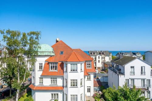 an image of houses with an orange roof at Schloss am Meer App 5 in Ahlbeck