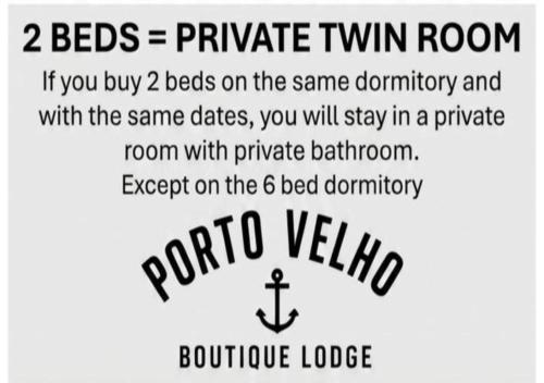 a picture of a sign that says beds private twin room at Porto Velho Boutique Lodge in Madalena