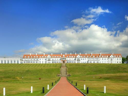 a large white building with a red roof at Royal Aberdeen - Ukc6917 in Turnberry