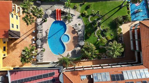an overhead view of a mural on the side of a building at Apartamentos Atlántico Resort in Montalvo