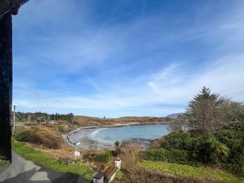 a view of a river from a road at Plover Apartment - Uk51129 in Carradale