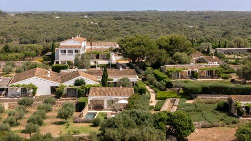 an aerial view of a house at Torralbenc, a Small Luxury Hotel of the World in Cala en Porter