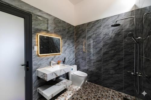 a bathroom with a sink and a shower at Golden Hill Villas Phu Quoc in Phú Quốc