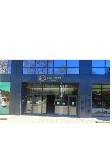 a store front of a building with a sign on it at Apartment in Chantrer Residence with garage in Burgas
