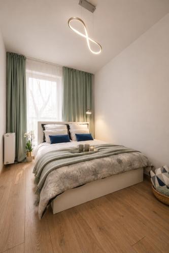 Foto Premium Apartment near Manufaktura 2 Bathrooms & Underground Parking 6