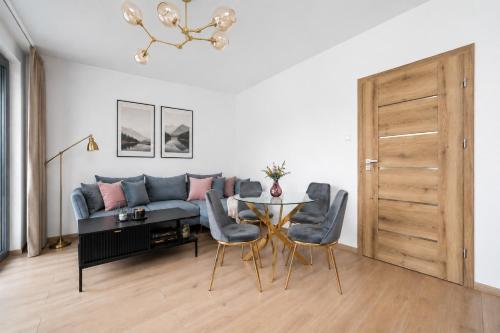 Foto Premium Apartment near Manufaktura 2 Bathrooms & Underground Parking 3
