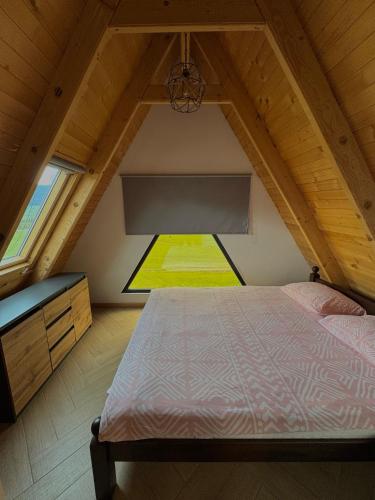 Llit o llits en una habitació de Vlasic Odmor - Villa Una & sauna
