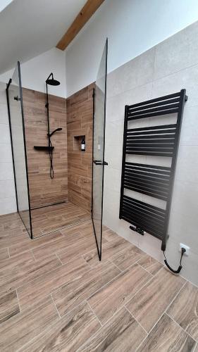 a large bathroom with a shower and a shower at Thomas home in Homole