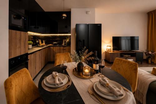 Foto Premium Apartment near Manufaktura 2 Bathrooms & Underground Parking 1