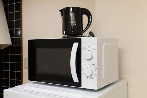 Apt 5-min Walk to Matsuyama City Station Up to 4 Guests