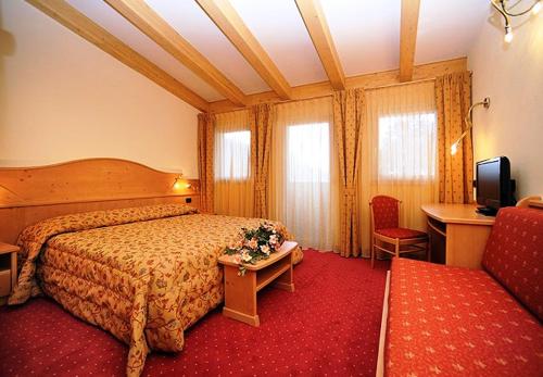 Postel nebo postele na pokoji v ubytování Hotel Europa