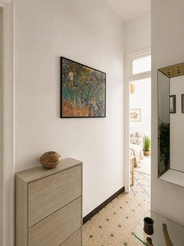 a living room with a painting on the wall at Van Gogh Luxury Flat By CH Luxury Apartments in Alicante