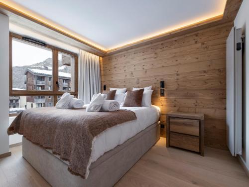 Duplex alpin 120 m², 4 chambres, cheminée à Val d'Isère
