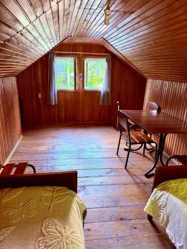 a room with a table and a dining room at House in Gonio-Kvariati economy class in Kvariati