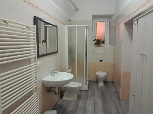 a bathroom with a sink and a toilet at RB Della Torre in Porretta Terme