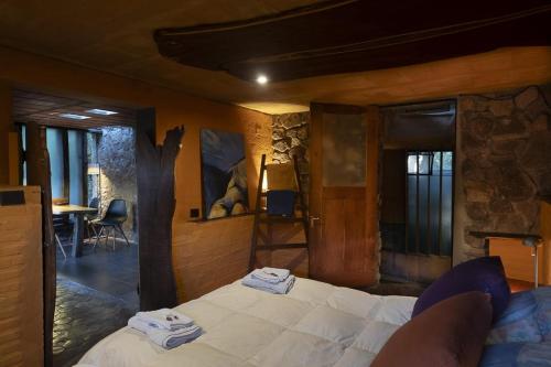 a bedroom with a bed with towels on it at Apart Domus in San Javier