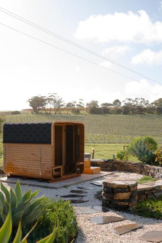a cabin in the middle of a field at Miravino, winery stay with outdoor sauna and spa in McLaren Vale