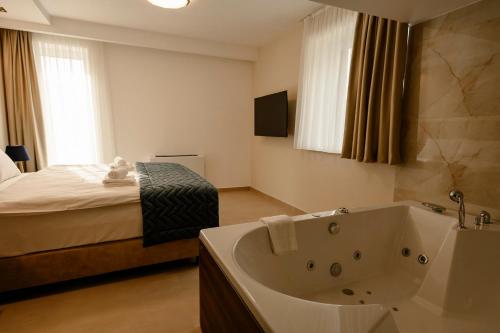 Llit o llits en una habitació de Hotel Leskovac