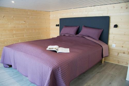 Un pat sau paturi într-o cameră la Ammatour Villas