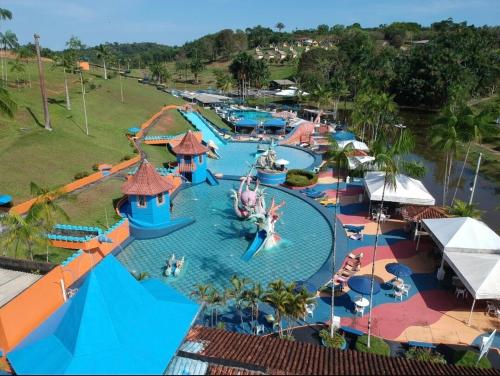 an aerial view of a water park with a water slide at ECO CHALÉ PARK CACHOEIRAS in Presidente Figueiredo