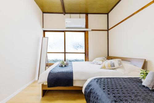 Shinagawa area , detached house , 2LDK , 3-minute walk from Tachikawa station , in the shopping district ,4 semi-double beds