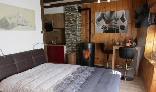 Postel nebo postele na pokoji v ubytování Chalet "Chez Claudine et Charles"