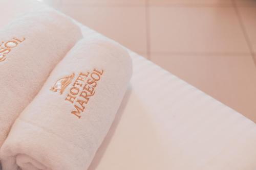 a roll of toilet paper with the words happy new year on it at Hotel Maresol Accommodation in Shëngjin