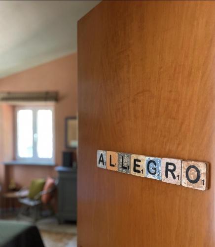 a door with a sign that says alredo on it at B&B La Vera Vita in Troviggiano