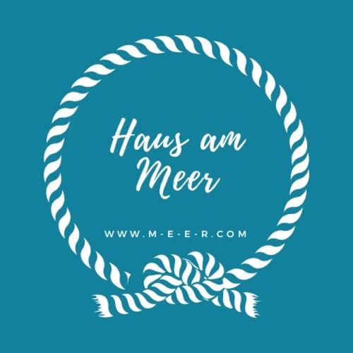 a wreath of rope knots on a blue background at Haus am Meer Eckwarden in Butjadingen